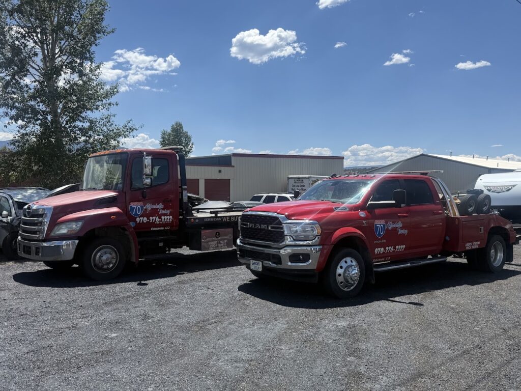 Affordable Towing flatbed and wrecker trucks parked in Eagle County, Colorado