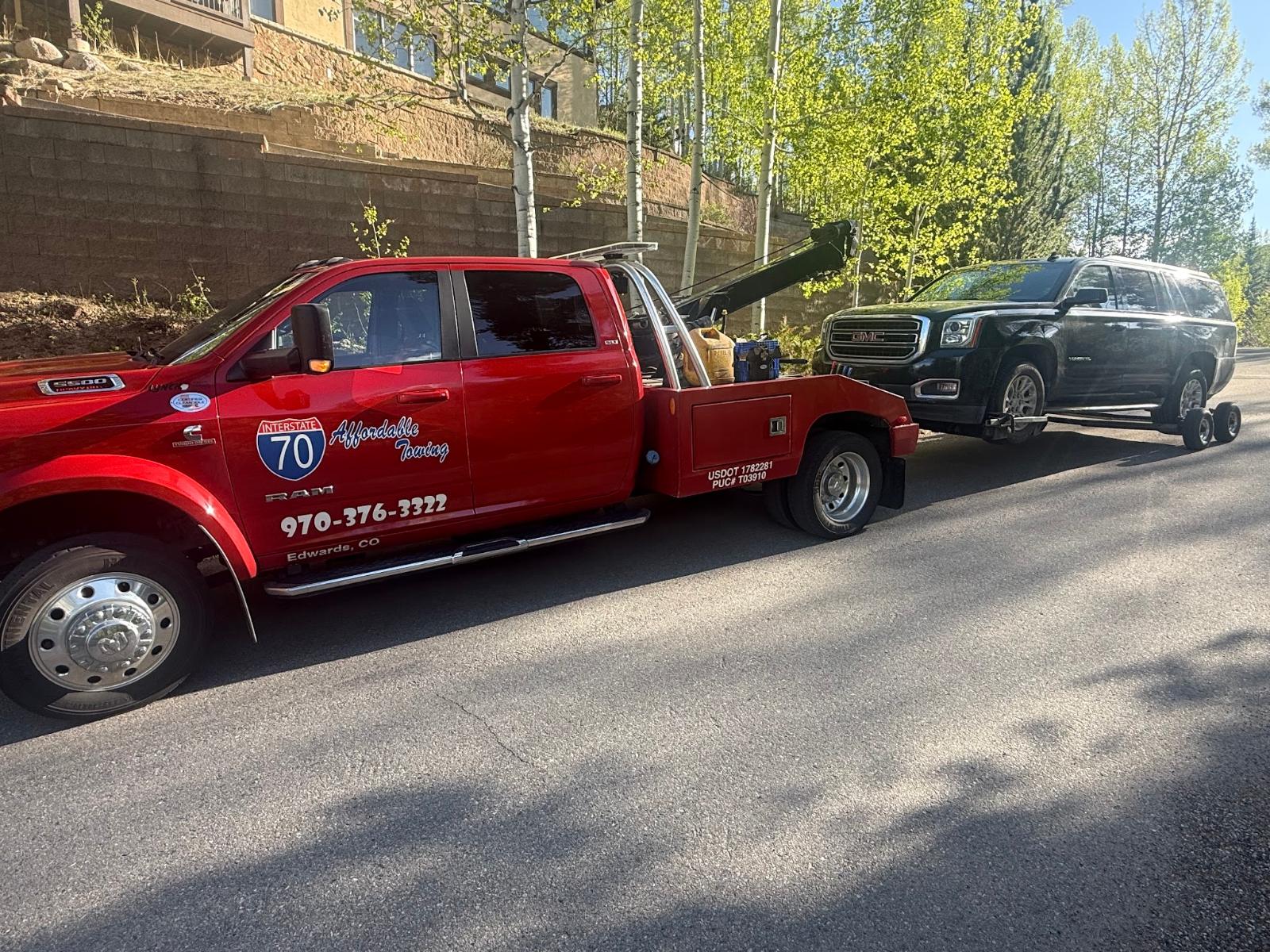 Affordable Towing flatbed tow truck serving Avon, Colorado near Beaver Creek